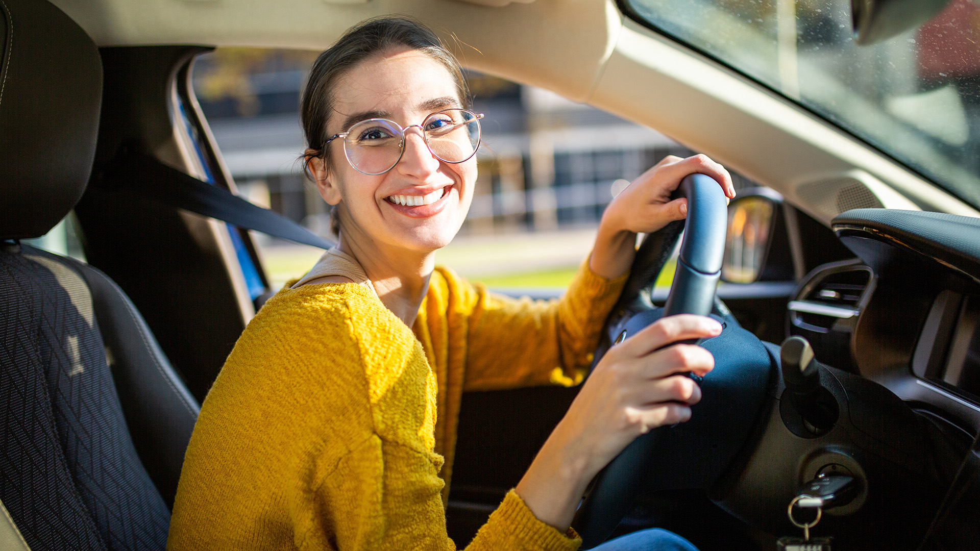 Jeune fille au volant
